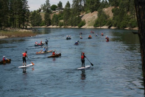 Solo canoes and kayaks race down the Spokane River ~ photo courtesy of Mt. Gear